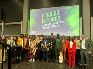 Student and youth representatives stood infront of Forging Futures banner